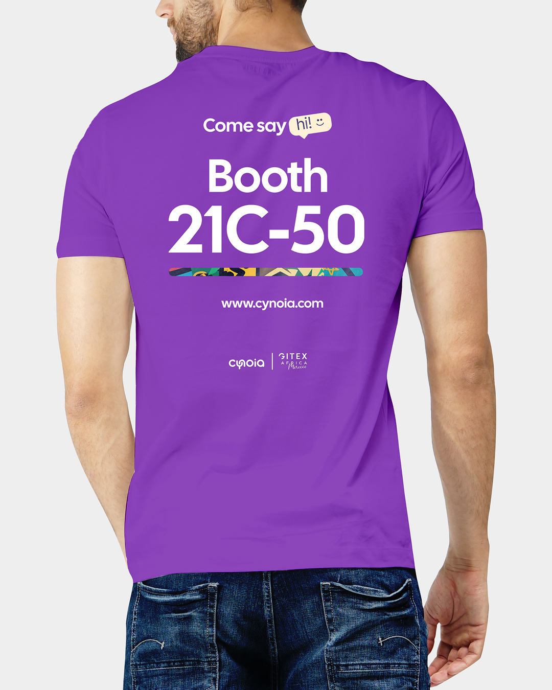 Cynoia print: a purple tee, back, 'Come say hi! Booth 21C-50, www.cynoia.com', GITEX Africa Morocco lockup